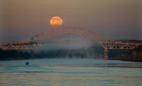 Full Moon Setting Behind Sagamore Bridge