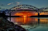 Akigned Bridges with centered sunset